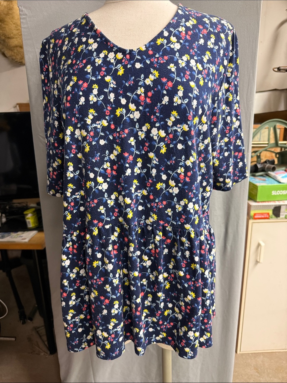 Women's Navy Floral Peplum Waist. Short sleeve stretchy.